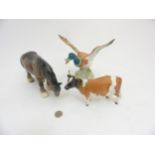 A quantity of 3 Beswick animal figurines comprising a Shire Horse, 9 1/2" wide,