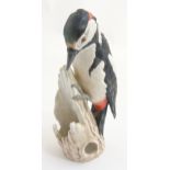 A Goebel bird figurine of a Woodpecker CV81, in a matte finish, makers mark to base,