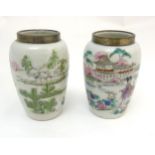 A pair of Chinese famille rose vases with silver rim,