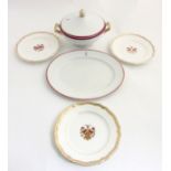 A quantity of assorted armorial ceramics comprising an oval platter and tureen by Sharpus & Callum,