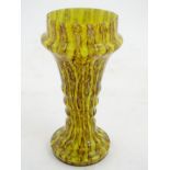 An End of Day glass vase with brown over yellow pedestal vase,