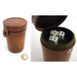 A Sheldon style leather dice shaker / cup having dice storage section to base,