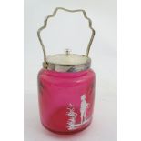 A Mary Gregory Style Cranberry Ice Bucket/biscuit barrel with silver plated swing over handle and