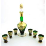 Murano Glass : A green and clear glass decanter and stopper with gilt and enamel decoration