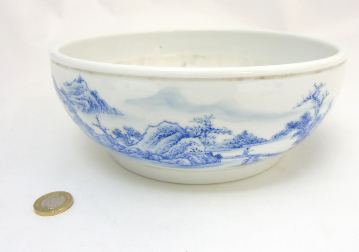 A Chinese blue and white bowl decorated in an underglaze blue continuous landscape and iron red - Image 4 of 8
