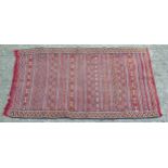 Rug / Carpet : With a triangle designs to border and striped central designs, in brown, red,
