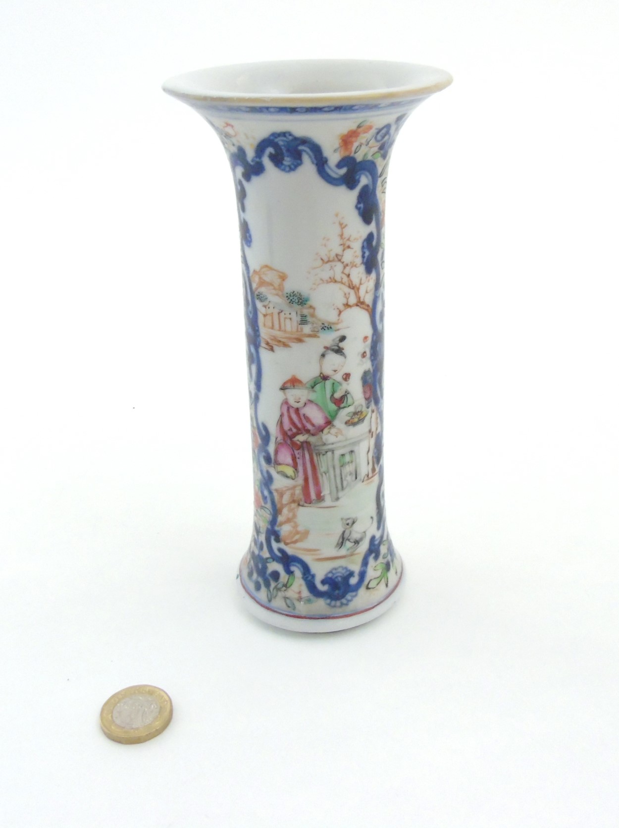 A Chinese Famille Rose vase of tall cylindrical form with flared rim,