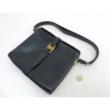 A Vintage ladies black Vimas? Paris made in France handbag with gilt hardware CONDITION: