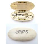 A 19thC Continental ivory etui with silver gilt and white metal tools to include scissors, bodkin,