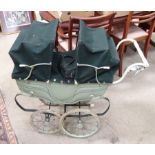 A Silvercross twin dolls pram (coach built) This lot is being sold for our nominated charity for