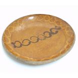 British Studio Pottery: A slipware charger by Bernard Leach,