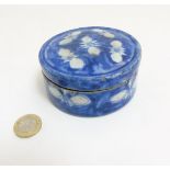 A Chinese blue and white circular lidded inkstone, 3 3/4" diameter,