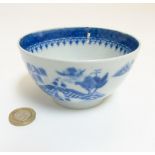 A late 18thC Liverpool blue & white sugar bowl depicting an oriental pagoda garden scene across