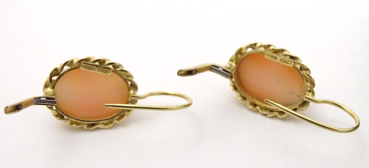 A pair of 18ct gold earrings set with coral cabochon . - Image 5 of 5