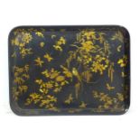 A 19thC gilt decorated papier-mache tray with gilt birds, insects, foliage etc.