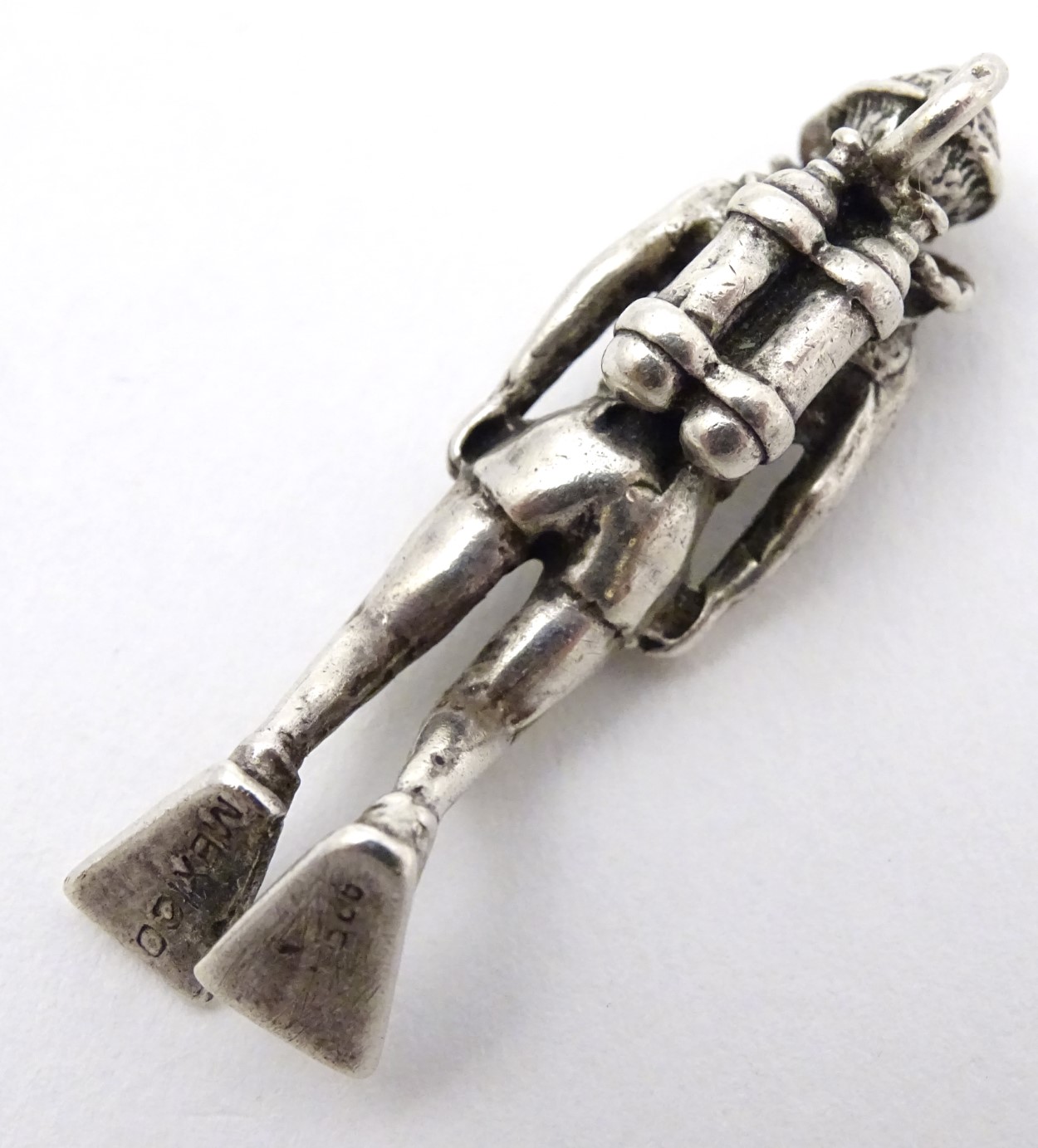 A Mexican silver pendant formed as a model of a scuba diver . Marked under. - Image 6 of 6