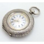 Silver Fob Pocket Watch : a half Hunter Fob watch with key wind movement having a gilt and black on