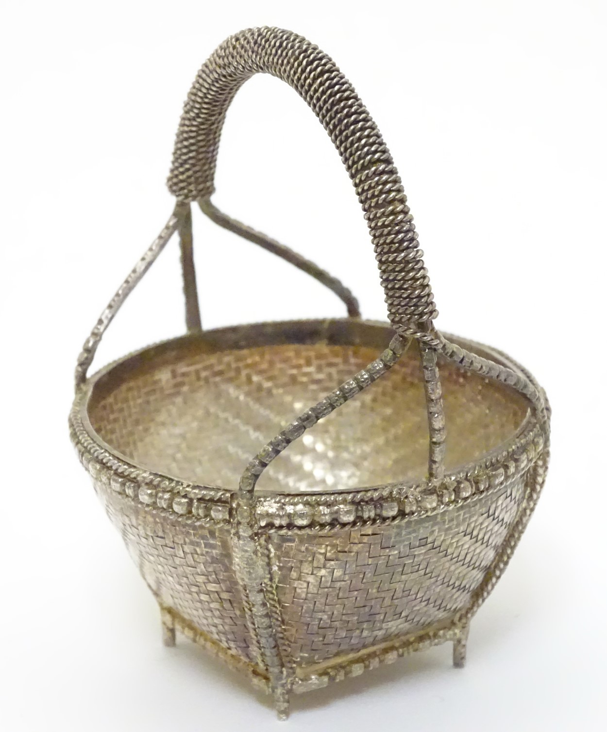 A small white metal basket with basket weave and gilt decoration. Possibly Indian. Approx 3" high. - Image 4 of 4