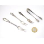 Scandinavian Silver : Four Norwegian silver (.830) items comprising sugar tongs and forks.