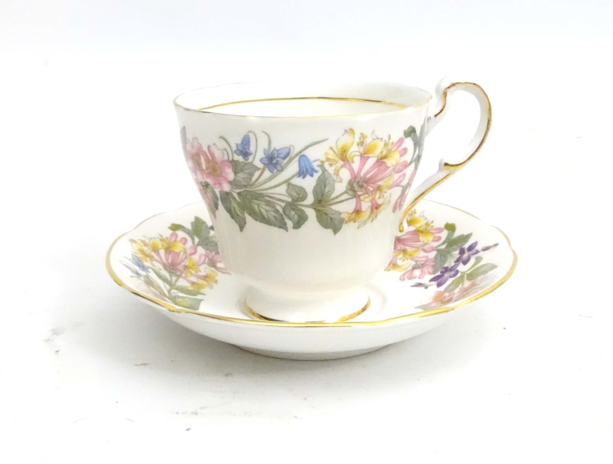 A quantity of Paragon Country Lane tea wares decorated with a white ground and a colourful floral - Image 4 of 11
