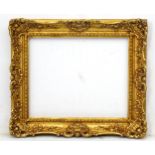 Gilt Picture frame : an ornate late 20thC ( in the Victorian Style ) aged gilt over gesso and wood