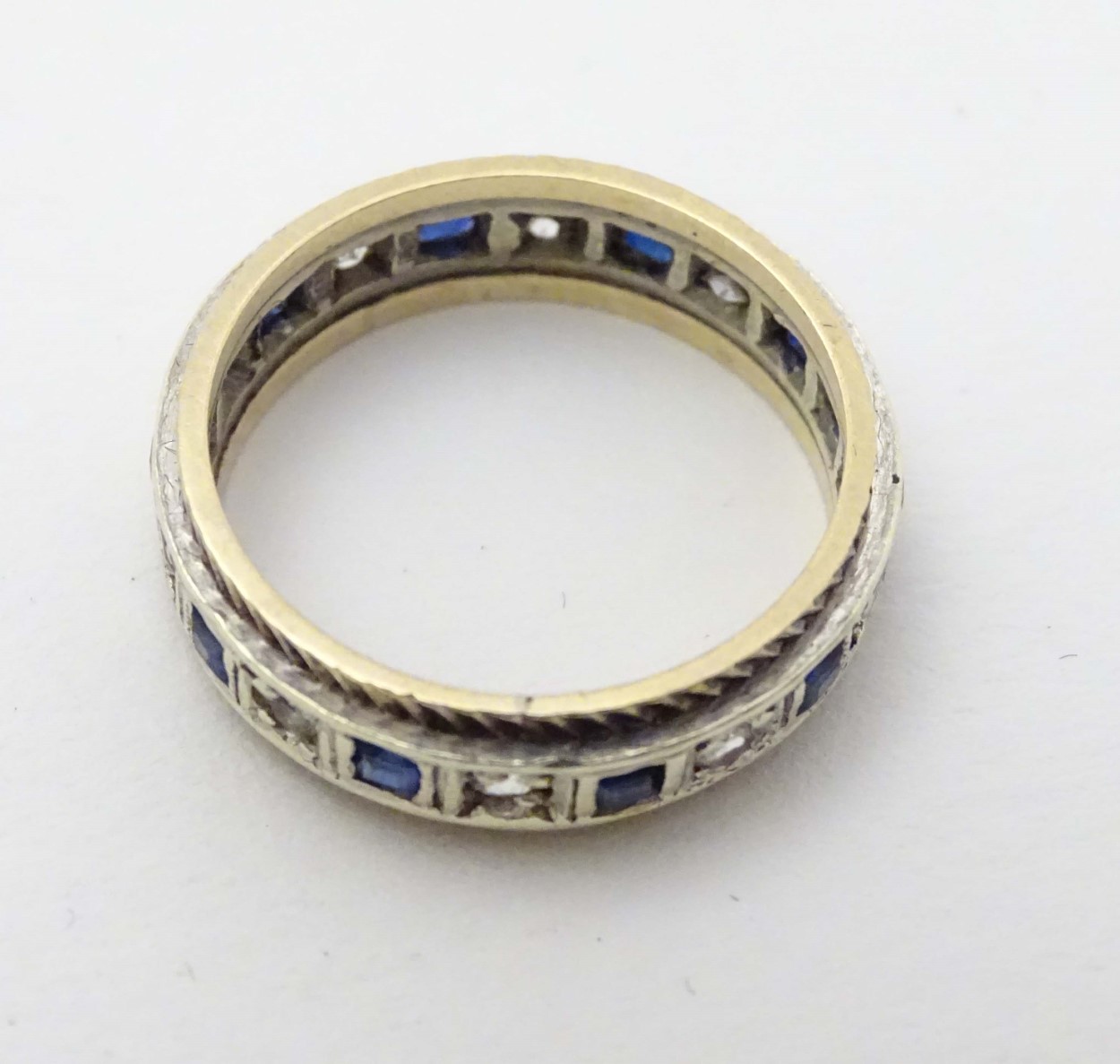 A 9ct gold ring set with blue and white stones. - Image 2 of 3