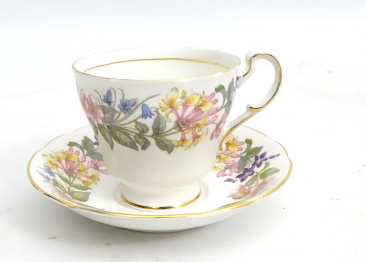 A quantity of Paragon Country Lane tea wares decorated with a white ground and a colourful floral - Image 5 of 11