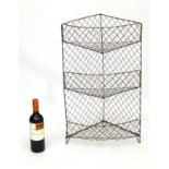 Veg - Rack : a three tier wirework corner vegetable rack measuring 26” high.