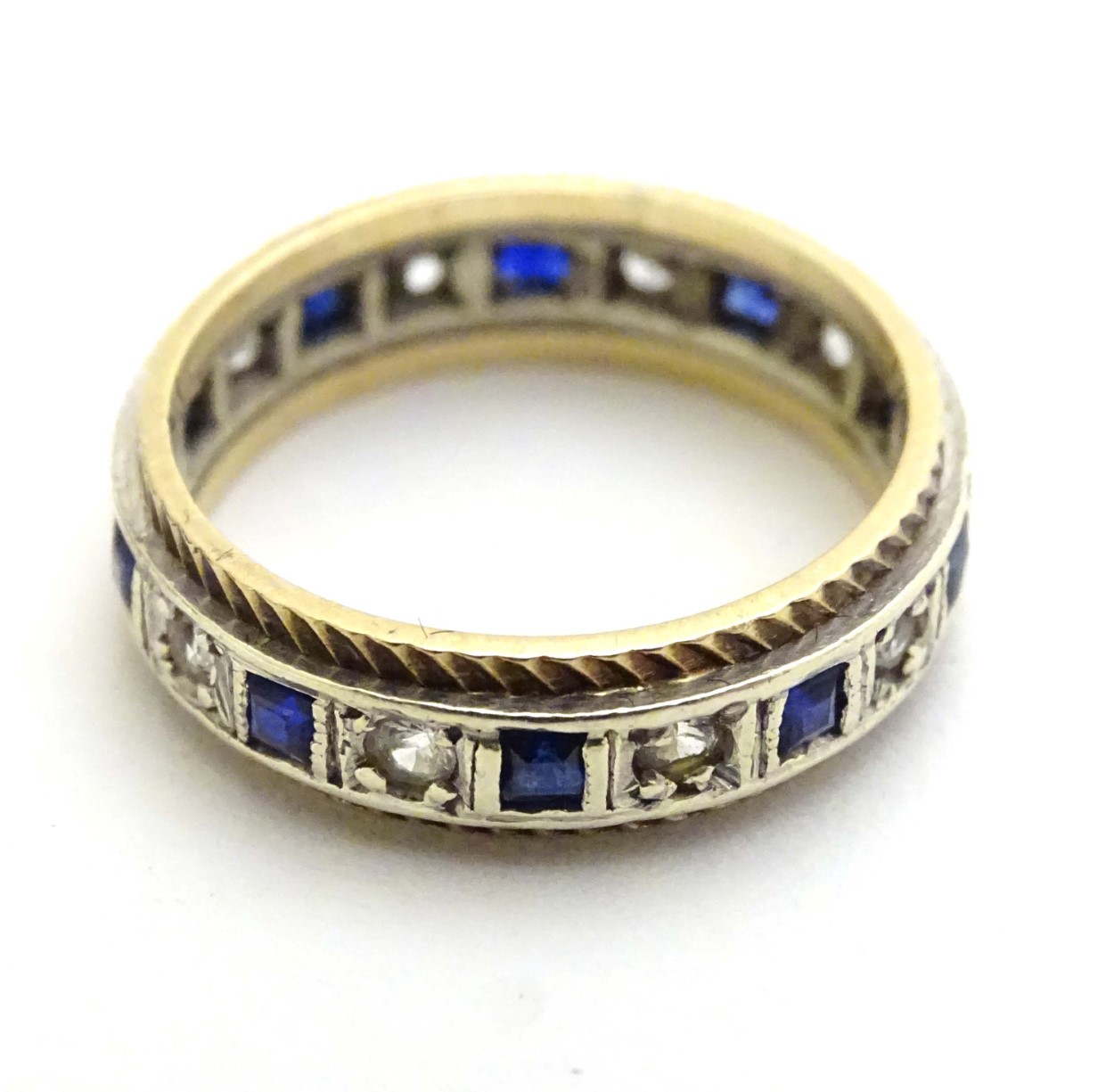 A 9ct gold ring set with blue and white stones. - Image 3 of 3