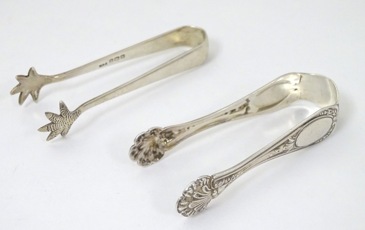 Small silver sugar tongs,