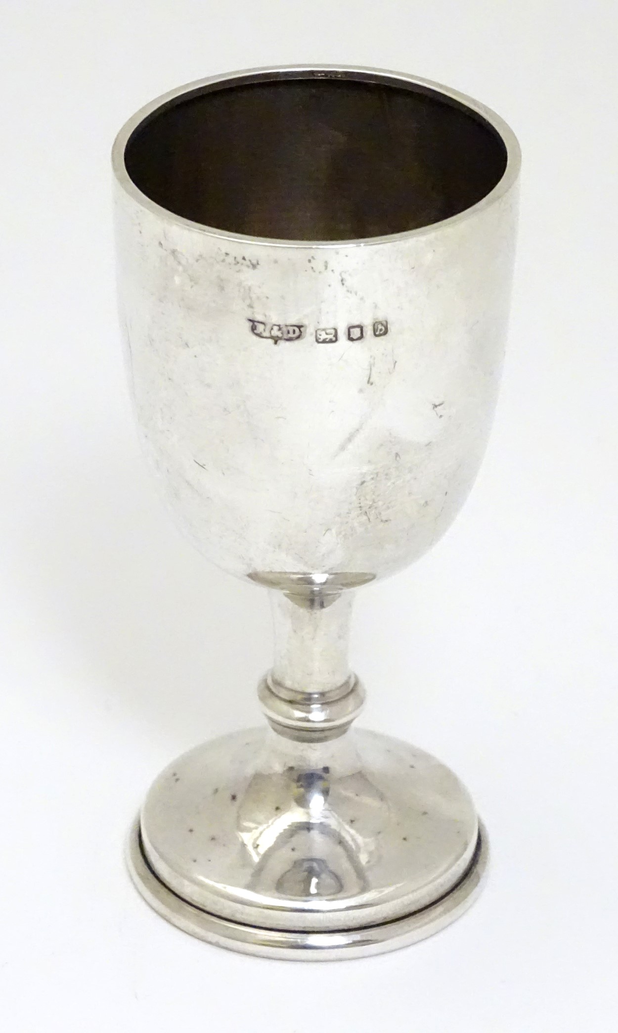 A small silver trophy cup hallmarked London 1957 maker Roberts & Dore Ltd.