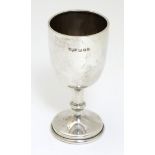 A small silver trophy cup hallmarked London 1957 maker Roberts & Dore Ltd.