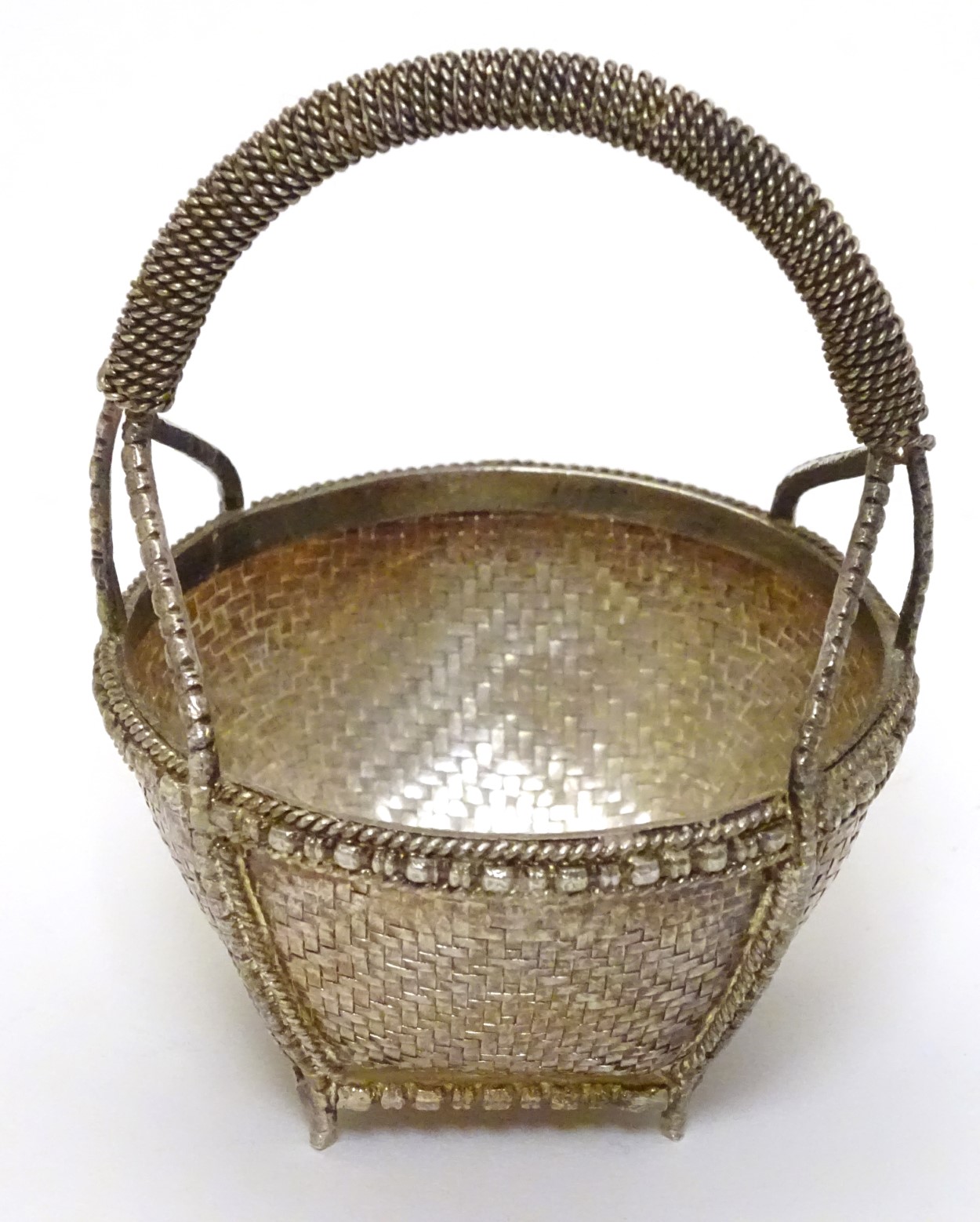 A small white metal basket with basket weave and gilt decoration. Possibly Indian. Approx 3" high. - Image 3 of 4