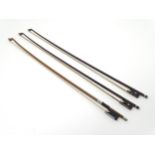 Musical Insruments: An assortment of three European early 20thC violin bows,