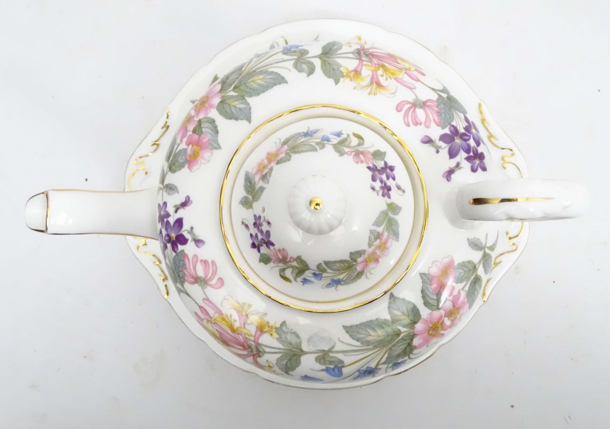 A quantity of Paragon Country Lane tea wares decorated with a white ground and a colourful floral - Image 2 of 11