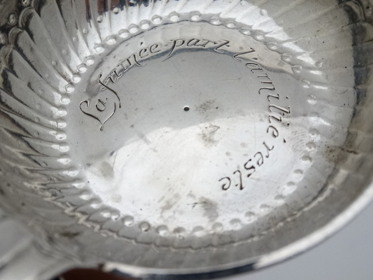 A French silver personal ashtray engraved ' La Fumée part l'amitié reste 3 1/4" long - Image 2 of 4