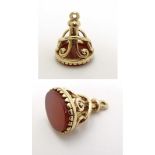 A 9ct gold pendant fob set with carnelian hardstone 1 3/4" high CONDITION: Please