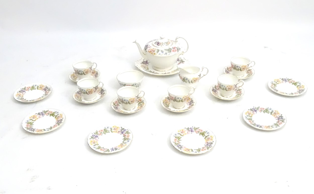 A quantity of Paragon Country Lane tea wares decorated with a white ground and a colourful floral