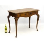 A late 19thC / early 20thC mahogany writing desk,