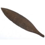 Ethnographic Native Tribal : an Aboriginal carved wooden Woomera having dark patina ,