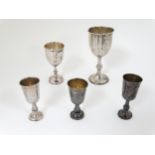 5 assorted silver cups to include 3 Kiddush cups hallmarked Birmingham 1911 maker Jacob Fenigstein,