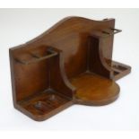 Pipe smoking: A c1900 arts & crafts styled oak pipe rack,