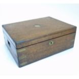 A Victorian oak and brass bound cutlery cabinet opening to reveal 3 blue baize lined lift out