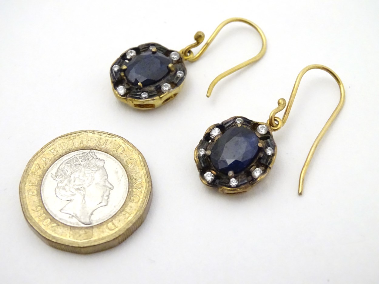 A pair of yellow metal drop earrings set with blue and white stones. - Image 2 of 4