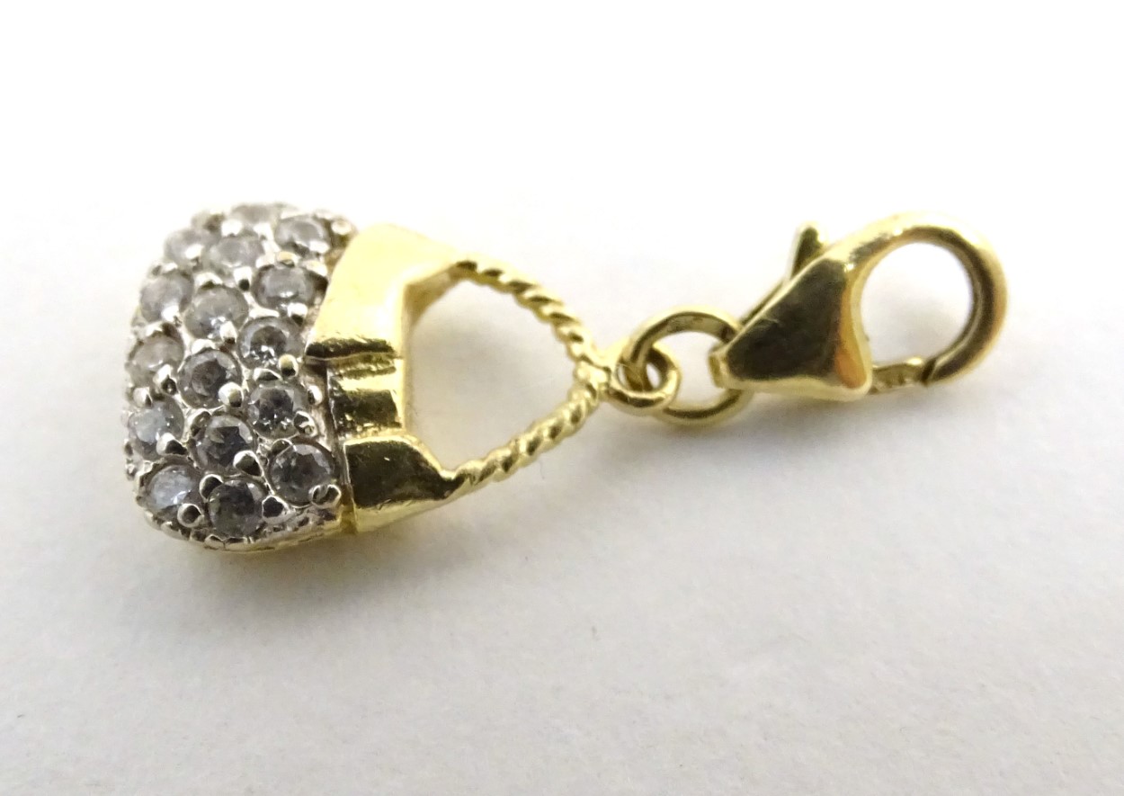 A 14ct gold pendant / fob formed as a basket set with white stones. - Image 5 of 5