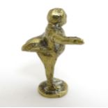 Pipe smoking: A mid-20thC brass pipe tamper, formed as a Victorian gentleman taking a bow,