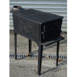 Woodburner : a Norwegian Jotul cast Iron four footed wood stove ,