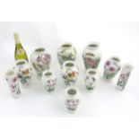A quantity of 11 Portmeirion 'The Botanic Garden' vases comprising 9 of baluster form and two of