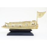 Chinese wedding barge: A late Victorian carved model of an old dusty carved ivory wedding barge,