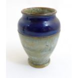 An early 20thC Royal Doulton stoneware vase possibly by Louise Russell,